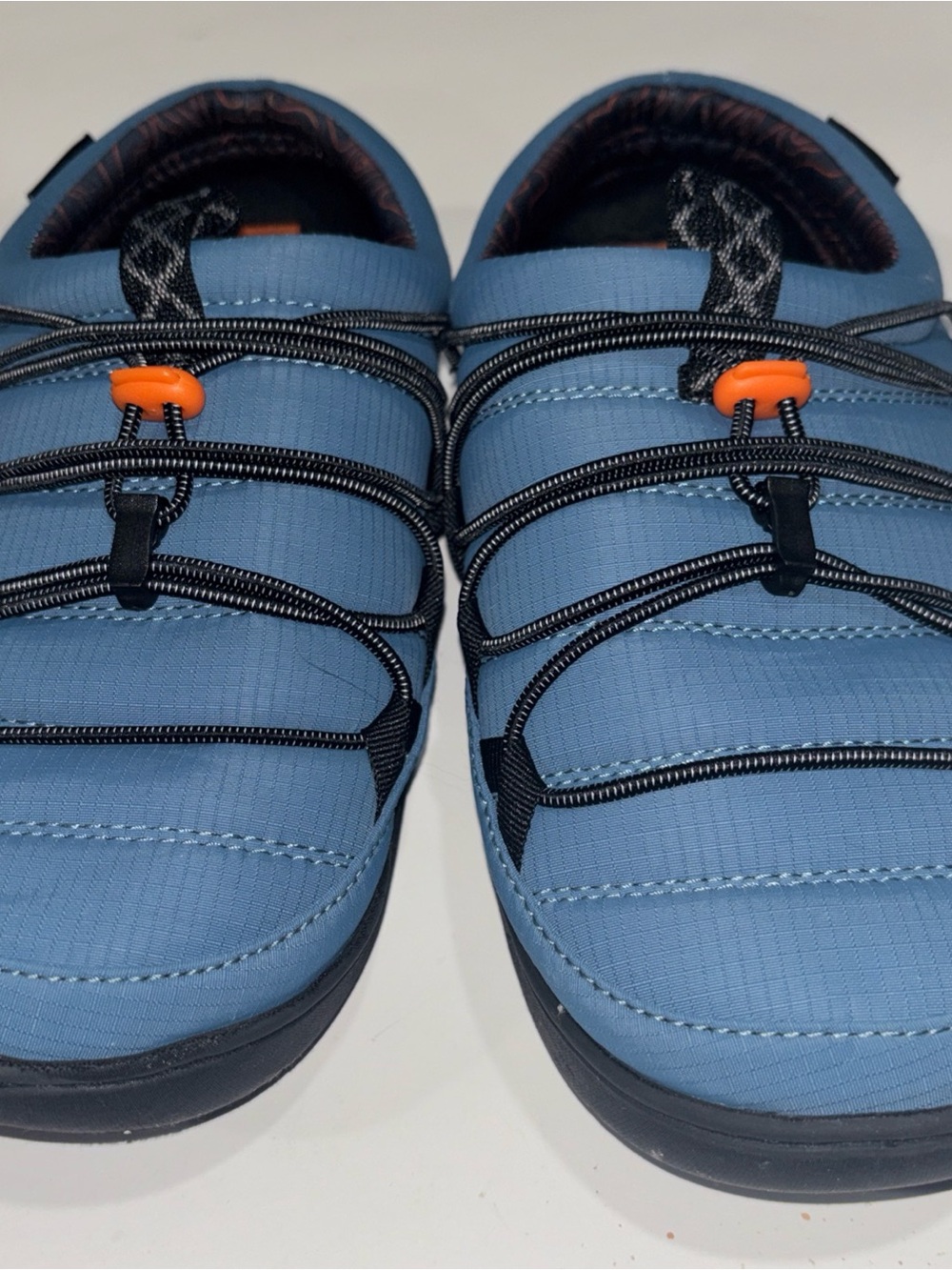 Ozark Trail Light Blue Slip-On Slippers with Black Elastic and Orange Toggles